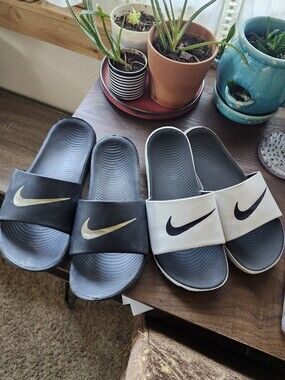 2 Pairs Of Nike Slides